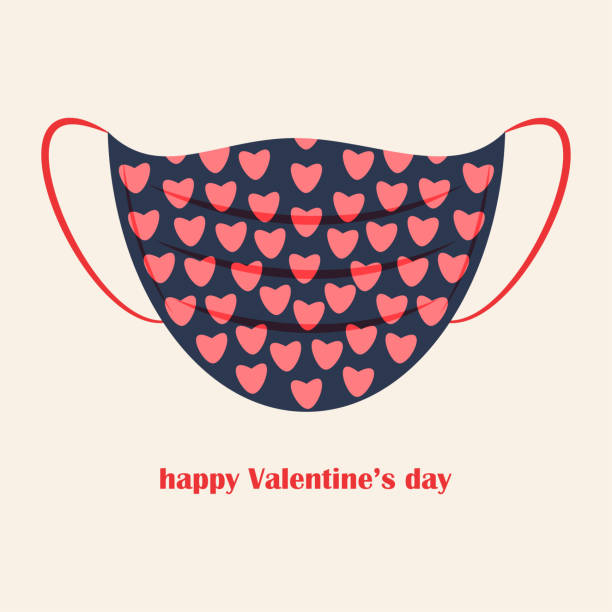 istock medical face mask with  Saint Valentine Day pattern print 2021. 1296644635
