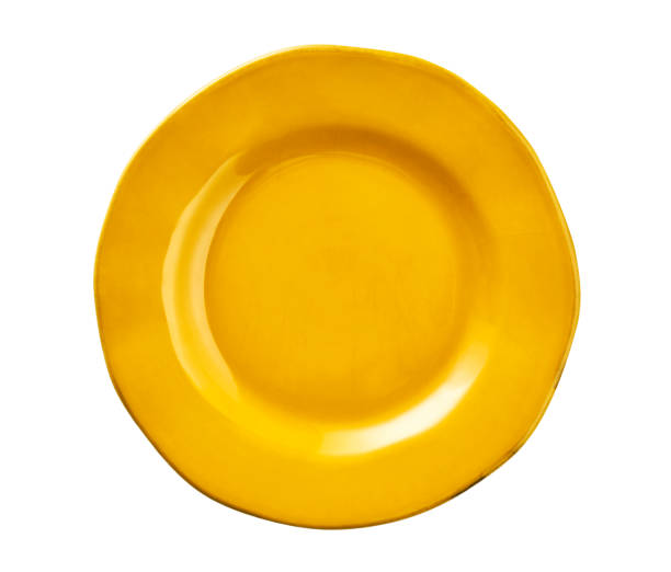 istock Empty yellow plate with wavy edge, Yellow ceramics plate, isolated on white background with clipping path, Top view 1296646894