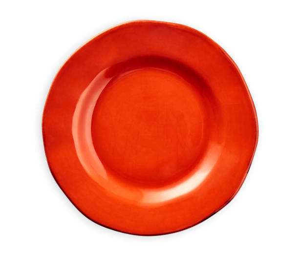 istock Empty red plate with wavy edge, Red ceramics plate, isolated on white background with clipping path, Top view 1296646898