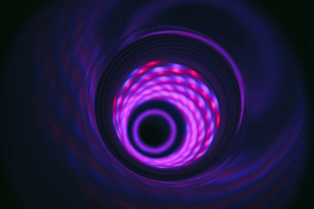 istock Beautiful Abstract swirl tunnel with violet light on a background pattern textured for design. 1296649047