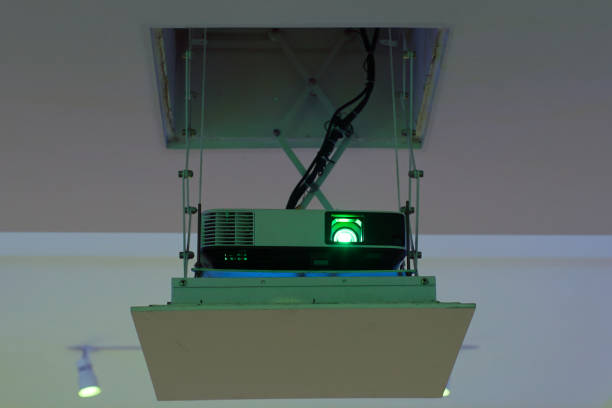 istock Projector installed on the ceiling of hotel conference room. 1296651424