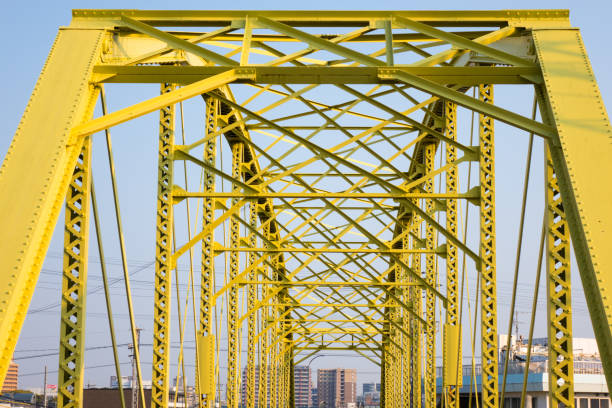 istock Yellow truss bridge in Japan 1296651563