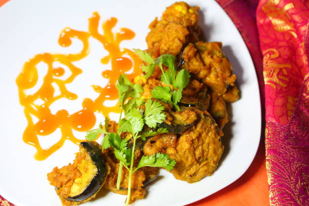 istock Pakora with coffee and milk 1296651831