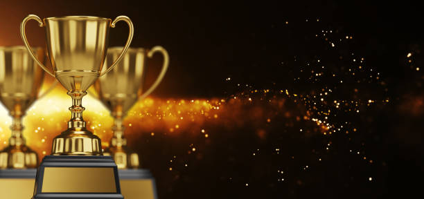istock Golden trophy cup on dark background. copy space for text. 3d rendering. 1296652478