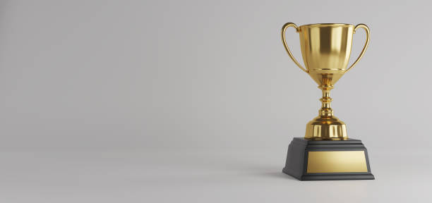 istock Golden trophy cup on white background. copy space for text. 3d rendering. 1296652493