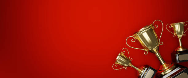 istock Flat lay golden trophy cup on red background. copy space for text. 3d rendering. 1296652514