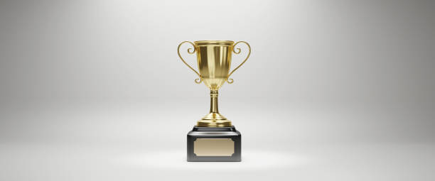 istock Golden trophy cup on white background. copy space for text. 3d rendering. 1296652515