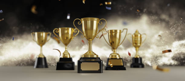 istock Golden trophy cup on dark background. copy space for text. 3d rendering. 1296652534