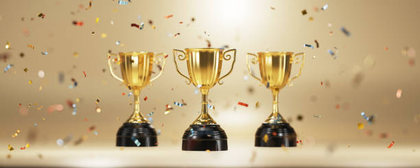 istock Golden trophy cup on gold background. copy space for text. 3d rendering. 1296652641