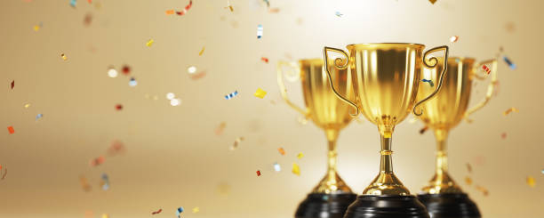 istock Golden trophy cup on gold background. copy space for text. 3d rendering. 1296652642