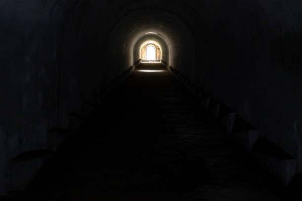 istock Light at the end of the tunnel 1296657192