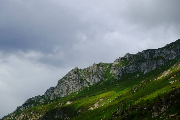 istock steep green hills in rocky mountains while hiking 1296657243