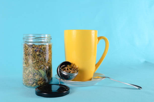 istock Cup of tea on a saucer with ingredients 1296657314
