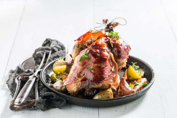 istock Teasty pheasant with bacon and vegetables and spices 1296659369