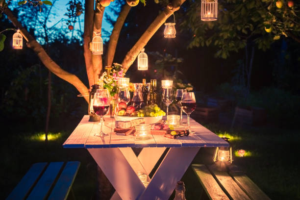 istock Table for dinner full of cheese and meats at dusk 1296660061