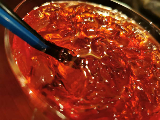 istock Ice in a cocktail and straws 1296666160