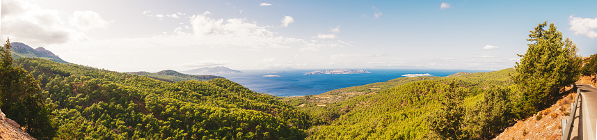 Northern shore of Rhodes with view of small island Chalki and alimia
