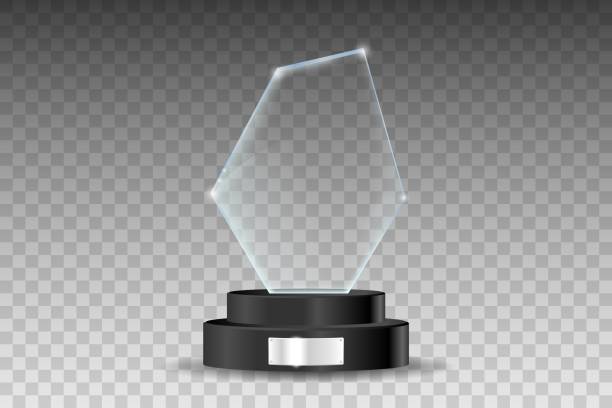 Glass trophy award. Shiny glass form on a black stand with shiny silver plate. Vector illustration of shiny award isolated on transparent background. Glass trophy award. Shiny glass form on a black stand with shiny silver plate. Vector illustration of shiny award isolated on transparent background trophy pedestal stock illustrations