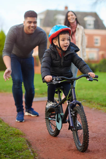 istock learning to ride a bike 1296672656