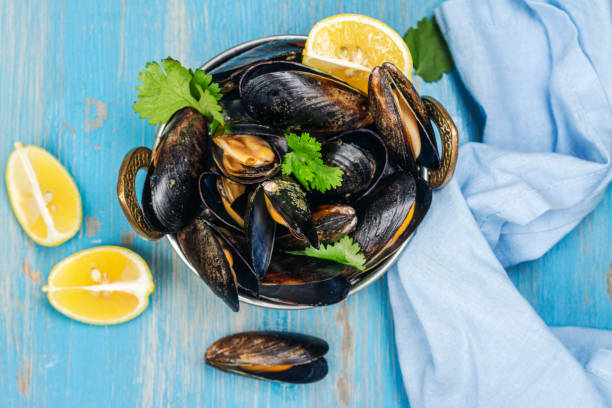 istock Cooked seafood mussels with lemon 1296674180