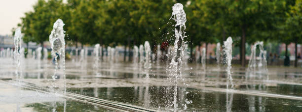 Photography of powerful Moscow fountains. Hot summer day in the Moscow public park.