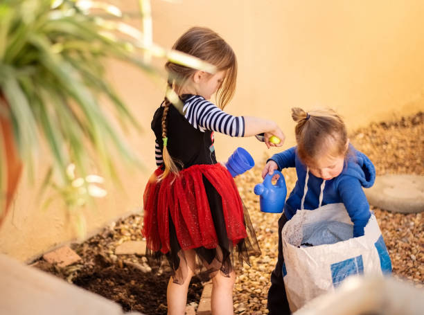 istock Two little gardeners at work 1296674707