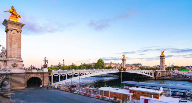 istock Alexander III bridge in Paris during sunset 1296678423