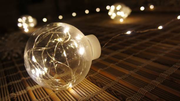 istock Home decor, glowing balls, garland on the wall 1296678891
