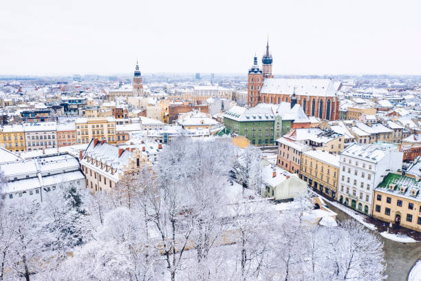 Aerial view of snow covered old town Krakow in Poland Aerial view of snow covered Krakow in Poland krakow stock pictures, royalty-free photos & images