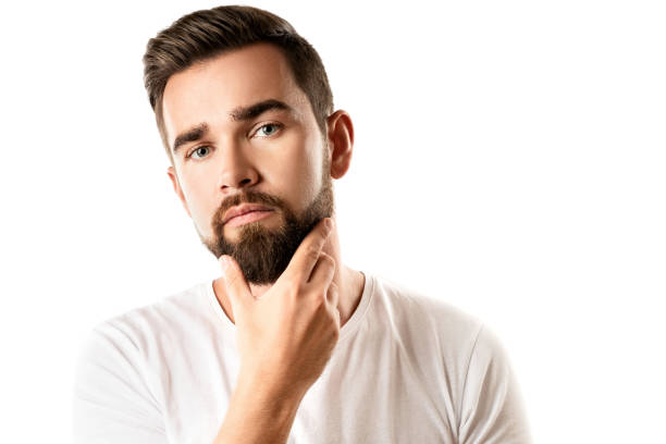 istock Young and handsome bearded man wearing white t-shirt 1296680895