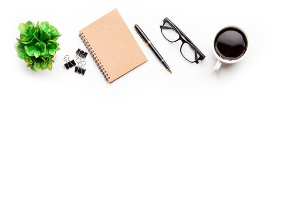 istock Flat lay, top view office table desk. Workspace with, laptop,office supplies, pencil, green leaf, and coffee cup. 1296681894