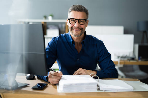 istock Tax Accountant Advisor Man Doing Accounting 1296687967