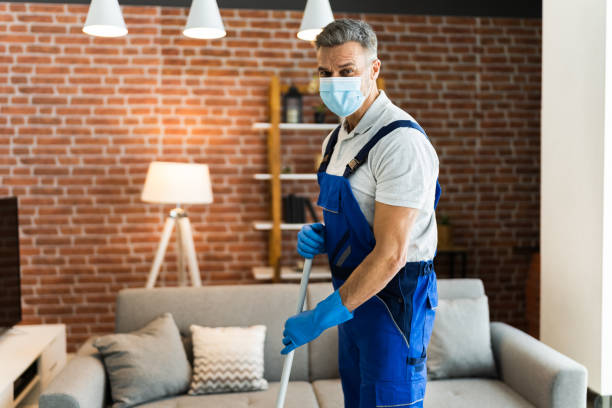 istock Man Cleaning The Hardwood Floor With Mop 1296687985