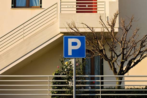 istock A blue road sign with a white 