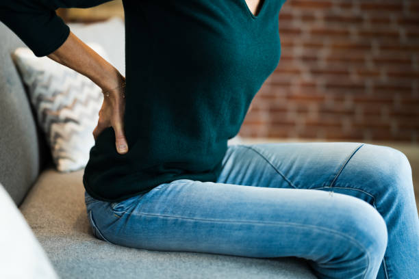 istock Woman With Back Pain And Ache 1296688852