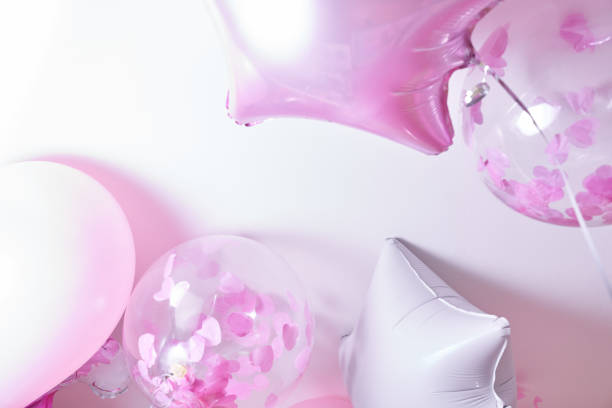 istock Pink balloons on a white background 1296689362