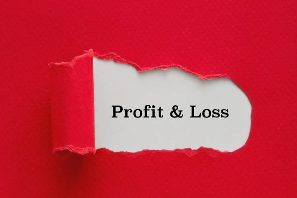 istock Profit and Loss written under torn paper. 1296697011