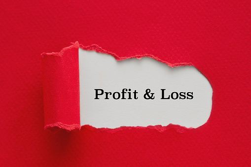 Profit and Loss written under torn paper.