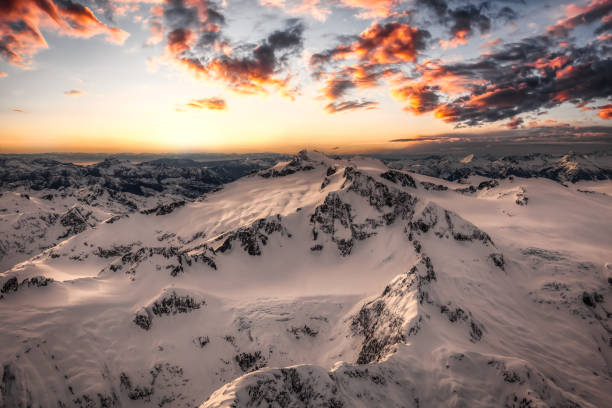 istock Aerial view from above of White Glacier Mountains. 1296697108