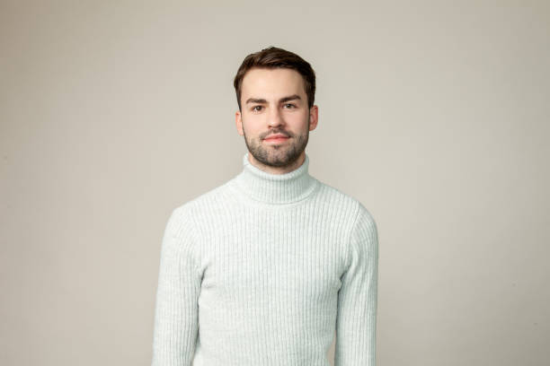 istock Studio portrait of attractive 20 year old bearded man 1296698334