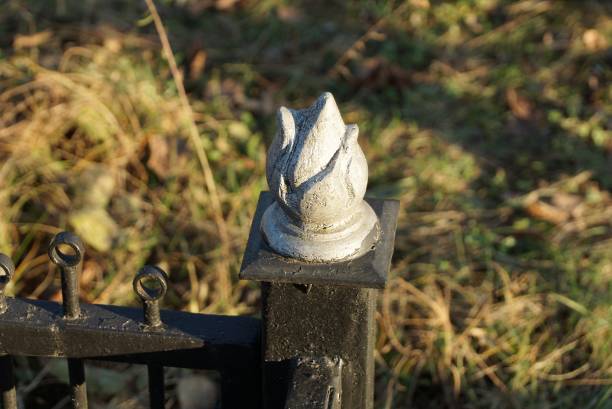 istock black iron decorative fence with a sharp one detail 1296702930