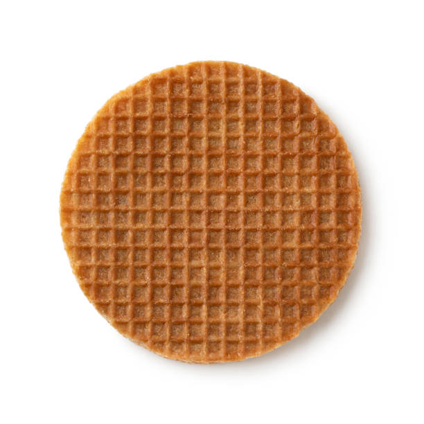 istock Single traditional Dutch syrup waffle close up isolated on white background 1296709932
