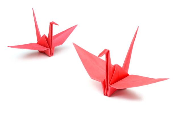 istock origami red bird paper on white background 1296710839