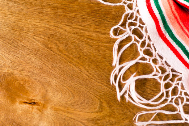 istock Serape cloth on wooden table 1296713323