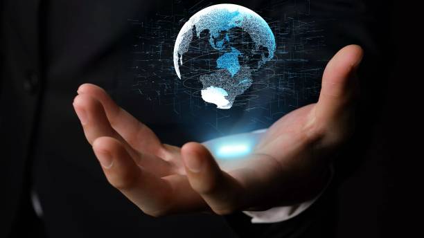 istock Human hand holding earth globe holographic technology 1296715080