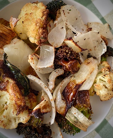 Air fried roasted fresh cauliflower, broccoli and onions with garlic powder, salt and pepper.