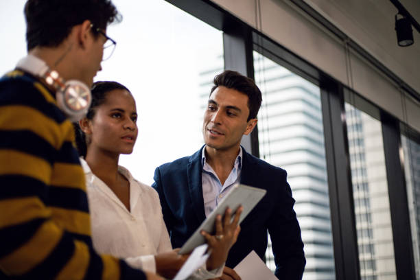 istock Happiness young business teamwork meeting and discuss in the office. 1296718521