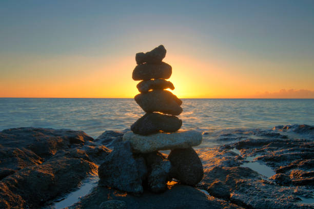 istock Rock stack on the beach at sunset. Big Island,  Hawaii 1296720938