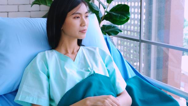 istock Happy patient getting well improvement at hospital 1296720955