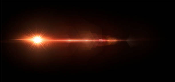 istock Shining sun with glare and flare in a dark background 1296721135